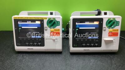 1 x Philips Heartstart XL+ Defibrillators Including Pacer, ECG, SpO2 and Printer Options, 1 x Philips Heartstart XL+ Defibrillators Including Pacer, ECG and Printer Options (Both Power Up) *SN US31716614 / USN1307802*