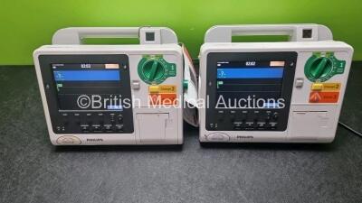 2 x Philips Heartstart XL+ Defibrillators Including ECG and Printer Options (Both Power Up) V*SN US61717199 / US61717200*