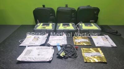 3 x Zoll AED PRO Defibrillators with 3 x Batteries, 1 x 3 Lead ECG Leads, 6 x Electrode Packs * 1 x In Date 5 x Out of Date (All Power Up, 1 x Scratches on Screen, See-Photo) in Carry Cases *SN AA06E002579 / AA08H011362 / AA13C27894*