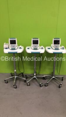 3 x Verathon Bladderscan BVI 9400 with 3 x Transducers, 1 x Battery (Flat) and Charger (No Power Supply) on Stands