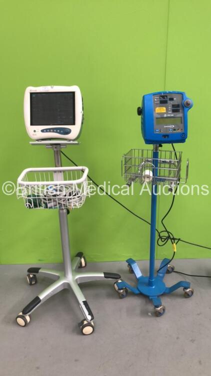 1 x Mindray PM-7000 Monitor on Stand with Various Leads and 1 x GE Pro 300 Dinamap Monitor on Stand (Both Power Up) *010M3259170 / CE86107279*