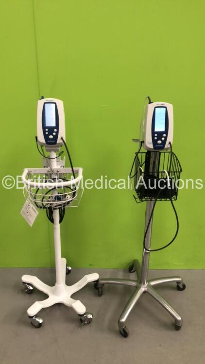 2 x Welch Allyn Spot Vital Signs Monitors on Stands with 2 x AC Power Supply, 1 x SpO2 Finger Sensor, 1 x BP Hose and 1 x BP Cuff (Both Power Up)