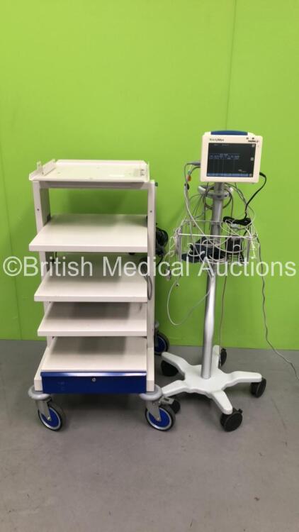 Mixed Lot Including 1 x CTL Medical Stack Trolley and 1 x Welch Allyn Propaq CS Monitor Including ECG, SpO2, NIBP, T1 and T2 Options with 1 x NIBP Hose, 1 x BP Cuff, 1 x SpO2 Finger Sensor and 1 x AC Power Supply on Stand (Powers Up) *SN GA115807, 8590*