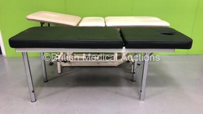 1 x Akron Hydraulic Trolley (Hydraulics Tested and working with Tear on Cushion-See Photo) 1 x Patient Couch with Standing Legs (Unknown Model)