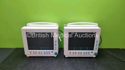 2 x GE Datex Ohmeda Compact Critical Care Patient Monitors with Printer Options (Both Power Up with Damage to Casing See-Photos)