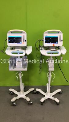 2 x Welch Allyn 6000 Series Monitors on Stands with 2 x SpO2 Leads with Sensors (Both Power Up)