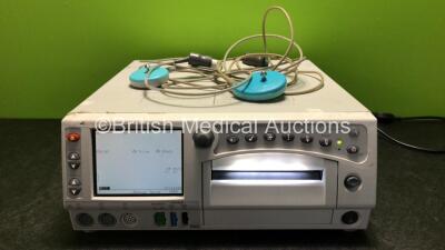 GE 250cx Corometrics Series Fetal Monitor with US,US2,UA,FECG/MECG,SpO2, NIBP and Printer Options with 1 x US Transducer and 1 x TOCO Transducer (Powers Up with Damage to Casing - See Photos)