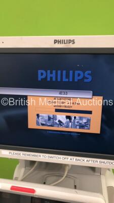 Philips iE33 Flat Screen Ultrasound Scanner on F.3 Cart *S/N 039X88* **Mfd 11/2009** Software Version 6.3.6.343 with 2 x Transducers / Probes (S5-1 and D2cwc) and 3 Lead ECG Leads (Powers Up) ***IR686*** - 14