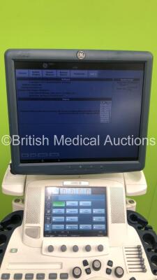 GE Logiq E9 Flat Screen Ultrasound Scanner Ref 5205000-7 *S/N 126051US2* **Mfd 03/2014** Software Version R4 Software Revision 3.0 (Powers Up - Small Scuffs - Missing Dial - Keyboard will Not Lock in Parked Position) ***IR692*** - 9