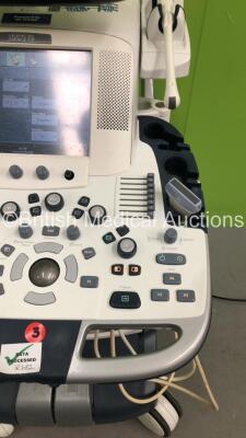 GE Logiq E9 Flat Screen Ultrasound Scanner Ref 5205000-6 *S/N 113876US7* **Mfd 10/2012** Software Version R3.1.3 with 3 x Transducers / Probes (C1-5-D Ref 5261135 *Mfd 09/2012* / 9L-D Ref 5194432 *Mfd 08/2012* and IC5-9-D Ref 5194434 *Mfd 02/2013*) (Power - 7