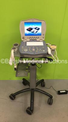 GE Logiq Book XP Portable Ultrasound Ref 2410792 *S/N 22862WX7* **Mfd 01/2005** Software Version XP-R2.1.5 with 2 x Transducers / Probes (3C Ref 2333860 *Mfd 11/2004* and 8L-RS Ref 2376127 *Mfd 09/2010*) on Cart (Powers Up with Donor Power Supply - Power 