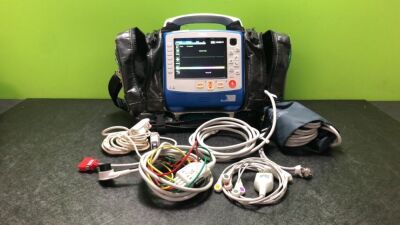 Zoll X Series Monitor/Defibrillator Including ECG, SPO2, NIBP, CO2 and Printer Options with 1 x Sure Power II Battery, 1 x NIBP Cuff and Hose, 1 x 4 Lead ECG Lead, 1 x 6 Lead ECG Lead, 1 x Paddle Lead and 1 x SPO2 Finger Sensor in Carry Bag (Powers Up and