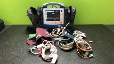 Zoll X Series Monitor/Defibrillator Including ECG, SPO2, NIBP, CO2 and Printer Options with 1 x Sure Power II Battery, 1 x NIBP Cuff and Hose, 1 x 4 Lead ECG Lead, 1 x 6 Lead ECG Lead, 1 x Paddle Lead and 1 x SPO2 Finger Sensor in Carry Bag (Powers Up and