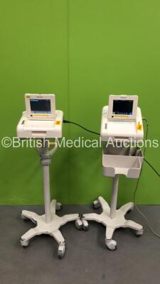 2 x Philips Avalon FM30 Fetal Monitors on Stands (Both Power Up, 1 with Missing Monitor Stand-See Photo)