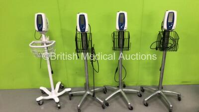 4 x Welch Allyn Spot Vital Signs Monitors on Stands with 4 x AC Power Supplies (All Power Up)