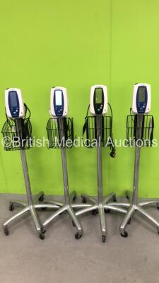 4 x Welch Allyn Spot Vital Signs Monitors on Stands with 4 x AC Power Supplies (All Power Up)