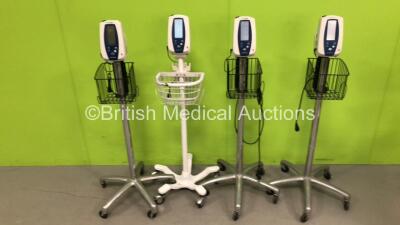 4 x Welch Allyn Spot Vital Signs Monitors on Stands with 4 x AC Power Supplies (All Power Up)