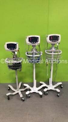 2 x Welch Allyn 53NT00 Patient Monitors on Stands and 1 x Welch Allyn 53N00 Patient Monitor on Stand with 3 x AC Power Supplies (All Power Up) *SN JA120060, JA077831, JA076585*