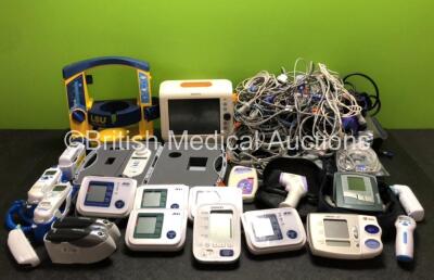 Mixed Lot Including 1 x Laerdal LSU Suction Unit (Powers Up) 1 x Philips SureSigns VS3 Monitor (Powers Up) 8 x Digital Blood Pressure Monitors, 1 x Graseby MR10 Monitor, 1 x CareFusion Smoke Check Spirometer in Case, 9 x Thermometers and Large Quantity of