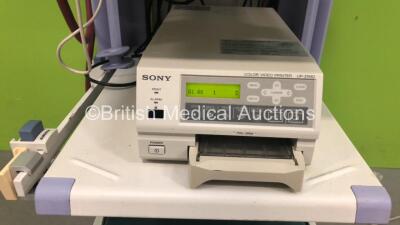 Olympus Stack Trolley with 1 x Olympus EVIS Lucera CLV-260SL Light Source, 1 x Olympus EVIS Lucera CV-260SL Digital Processor Unit, 1 x Keyboard, 1 x Sony UP-21MD and 1 x Tektronix 2235 Oscilloscope (All Power Up) *7722891 / 7712554 / 59083* - 4