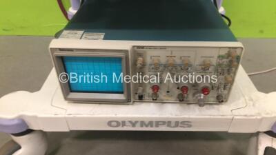 Olympus Stack Trolley with 1 x Olympus EVIS Lucera CLV-260SL Light Source, 1 x Olympus EVIS Lucera CV-260SL Digital Processor Unit, 1 x Keyboard, 1 x Sony UP-21MD and 1 x Tektronix 2235 Oscilloscope (All Power Up) *7722891 / 7712554 / 59083* - 5