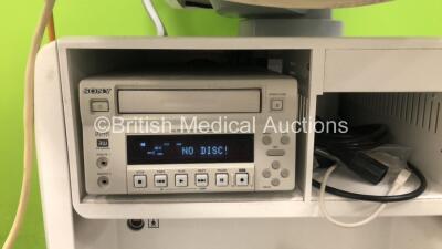 GE Voluson E6 Flat Screen Ultrasound Scanner *S/N D5570* **Mfd 05/2012* Software Version EC200 (Powers Up with Hard Drive Error, Casing Damage and 2 x Missing Dials) with 1 x Transducer/Probe (C1-5-D *Mfd 2015*) and Sony DV0-1000MD DVD Recorder - 6