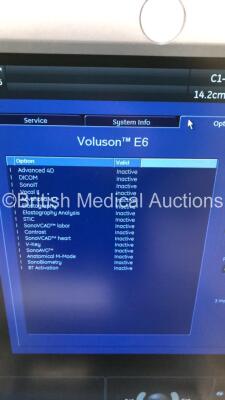 GE Voluson E6 Flat Screen Ultrasound Scanner *S/N D5570* **Mfd 05/2012* Software Version EC200 (Powers Up with Hard Drive Error, Casing Damage and 2 x Missing Dials) with 1 x Transducer/Probe (C1-5-D *Mfd 2015*) and Sony DV0-1000MD DVD Recorder - 26