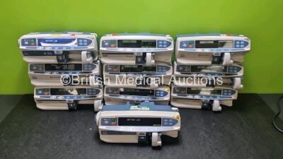 Job Lot Including 4 x Alaris GH Carefusion Syringe Pumps, 4 x Alaris GH Cardinal Health Syringe Pumps, 1 x Alaris Guardrails Plus BD Syringe Pump, 1 x Alaris CC Guardrails Plus Carefusion Pump ( 9 x Power Up 1 x No Power, Some with Damage to Casing - See 