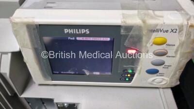 Job Lot 2 x Philips IntelliVue MP50 Neonatal Patient Monitors (Both Power Up Scratches on Screen - See Photos) 2 x Philips M3001A Multiparameter Modules with Press, Temp, NBP, SpO2 and ECG/Resp Options and 1 x IntelliVue X2 Handheld Patient Monitor with E - 5