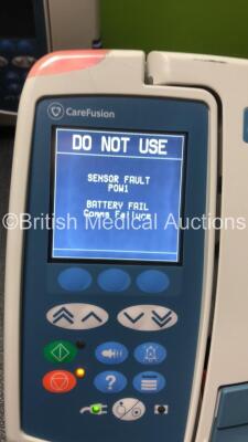 12 x Carefusion Alaris GP Guardrails Plus Infusion Pumps (All Power Up with Error - See Pictures) *S/N 800601582 / 470016200 / 470016020 / 470018356 / 1400154992 / 47018028 / 470016033 / 470016308 / 470018212 / 47114* - 7