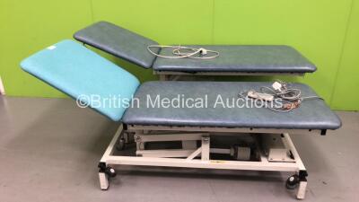 2 x Huntleigh Electric Patient Examination Couches (Both Power Up, 1 with Damaged Controller Cable and 1 with Damaged Cushion-See Photos) *SN NA*