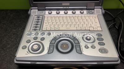 GE Logiq e Portable Ultrasound Scanner *Mfd - April 2010* with 1 x GE 4C-RS Ultrasound Transducer / Probe *Mfd - May 2010* and Power Supply (Powers Up, HDD Removed) *145654WX5* **IR717** - 3