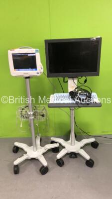 1 x Philips IntelliVue MP50 Patient Monitor on Stand (Some Casing Damage) and 1 x Philips Monitor on Stand with Esterline Keyboard (Both Power Up) *DE72950671*