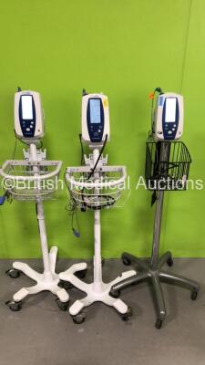 3 x Welch Allyn Spot Vital Signs Monitors on Stands with 3 x AC Power Supplies and Various Leads (All Power Up) *na*