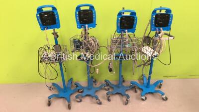 4 x GE ProCare Dinamap Monitors on Stands with Various Leads (All Power Up) *2019194-001 / AAW08180214SA / na*