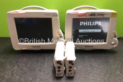 2 x Philips IntelliVue MP30 Patient Monitors (Both Power Up with Damage to Casing, 1 x Powers Up with Blank Screen - See Photos) with 2 x Philips M3001A Modules Including Press, Temp, NBP, SpO2 and ECG/Resp Options (1 x Damage to Casing - See Photos)