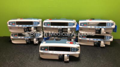 Job Lot Including 5 x CareFusion Alaris GH Syringe Pumps, 1 x CareFusion Alaris CC Syringe Pump and 1 x Cardinal Health Alaris GH Syringe Pump (All Power Up, 2 x Require Service)