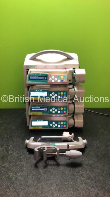 Job Lot Including 1 x B.Braun Perfusor Space TCI Syringe Pump (Damaged Casing - See Photo), 3 x B.Braun Perfusor Space Syringe Pumps, 1 x B.Braun Docking Station and 1 x Pole Mounting Bracket (All Power Up) *29789 / 99317 / 80293 / 88533 / 88224*