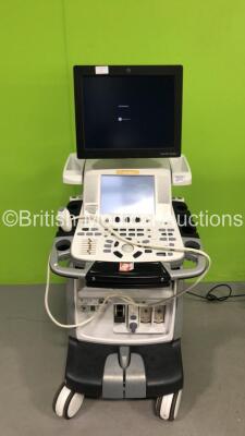 GE Vivid E9 XDclear Flat Screen Ultrasound Scanner *Mfd 11/2008* with 1 x GE 4V-D REF 5160209 Transducer / Probe *Mfd 07-2015* (Powers Up with Missing Dials and Buttons-See Photos HDD Removed) *SN VE90129*