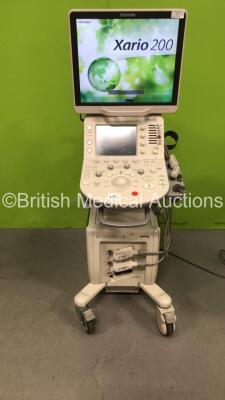 Toshiba Xario 200 Model TUS-X200 Flat Screen Ultrasound Scanner Software Version V2.0 with 2 x Transducers (1 x Toshiba 18L7 Model PLU-120BT Transducer *Mfd 2013* 1 x Toshiba 14L5 Model PLU-1005BT Transducer *Mfd 2014) (Powers Up with Missing Dial-See Pho