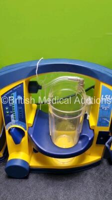 4 x Laerdal LSU Suction Units with 4 x Cups All with Missing Lids (All Power Up, 1 x Slight Damage to Casing - See Photo) *SN 78331076569 / 78020437668 / 78331076565 / 78390851992* - 5