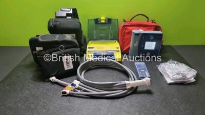 Job Lot Including 1 x Laerdal Heartstart FR2+ Defibrillator in Case (Powers Up and Pass Self Test) with 2 x M386A Batteries *Install Before 11-2023 / 11-2023* 1 x POwerheart AED G3 Defibrillator (Powers Up with Stock Battery Stock Battery not Included ) 4