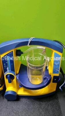 4 x Laerdal LSU Suction Units with 4 x Cups All with Missing Lids (All Power Up 2 x with Damage to Casing - See Photo ) *SN 78170896057 / 785109684426 / 78020437842 / 78510968427* - 2