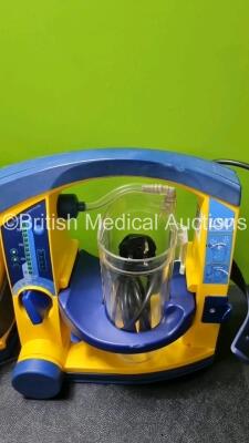 4 x Laerdal LSU Suction Units with 4 x Cups All with Missing Lids (All Power Up, 2 x with Damage to Casing - See Photos) *SN 78120440054 / 78100668687 / 78200441927 / 78120440090* - 2