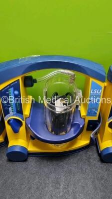 4 x Laerdal LSU Suction Units with 4 x Cups All with Missing Lids (All Power Up, 2 x with Damage to Casing - See Photos) *SN 78120440054 / 78100668687 / 78200441927 / 78120440090* - 4