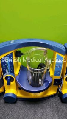 4 x Laerdal LSU Suction Units with 4 x Cups All with Missing Lids (All Power Up) *SN 7831076582 / 78331076573 / 78161071922 / 78331076581* - 4