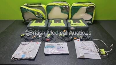 3 x Zoll AED PRO Defibrillators in Carry Cases (All pOwer up) Including 4 x 3 Lead ECG Leads, 2 x Batteries and 33 x Electrode Packs *All Out of Date 3 x in Photo*