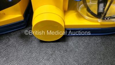 4 x Laerdal LSU Suction Units with 4 x Cups All with Missing Lids (All Power Up 1 x with Slight Damage to Casing - See Photo) *SN 78331076567 / 78021969004 / 7816107920 / 78161071916* - 6