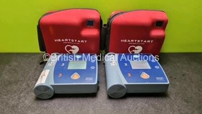 2 x Philips Heartstart FR2+ Defibrillators in Carry Cases with 2 x Philips M386A Batteries *Install Before12-202 / 02-2022* (Both Power Up and Pass Self Test) *SN 0410398825 / 0611890157*