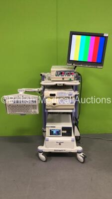 Olympus Stack Trolley Including 1 x Olympus OEV191H Monitor, 1 x Olympus UHI-3 Insufflator Unit, 1 x Olympus Exera II CLV-180 Light Source Unit, 1 x Keyboard and 1 x Olympus IMH-20 Image Management Hub (Powers Up) *SN 7729827, 7900864, 7778923, 7708157*